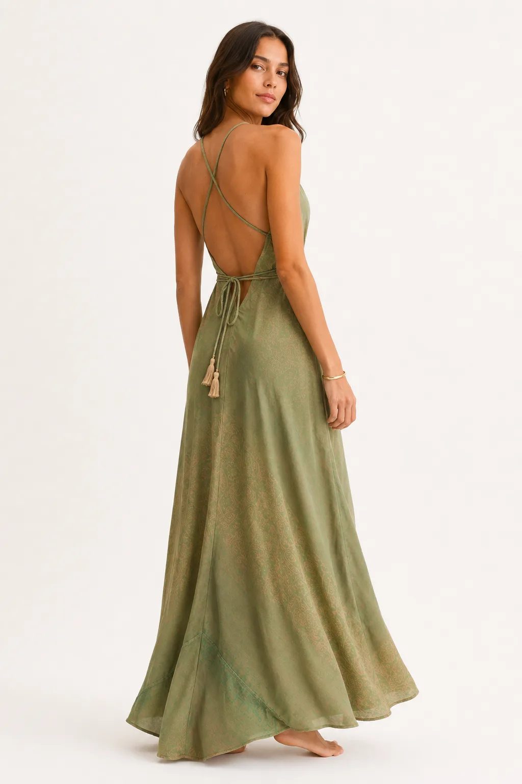 Sage green silk dress with deep V neckline and wraparound waist ties