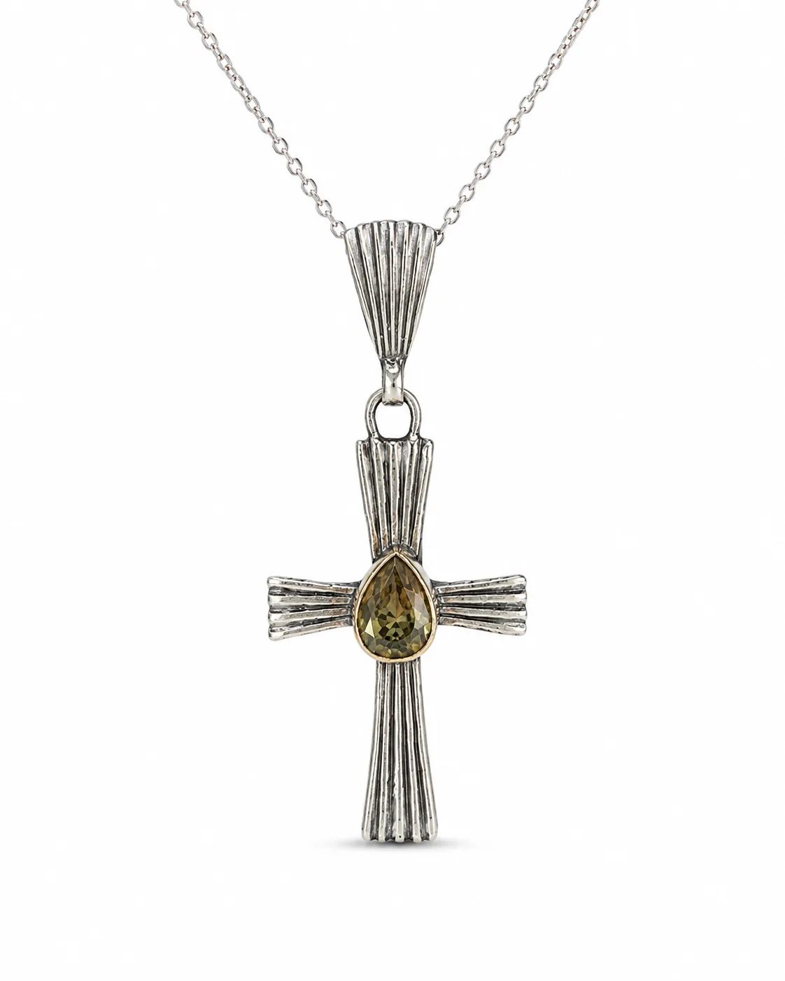 Pear-cut zultanite sterling silver cross pendant necklace with a faceted color-changing gemstone, ribbed silver texture and oxidized details
