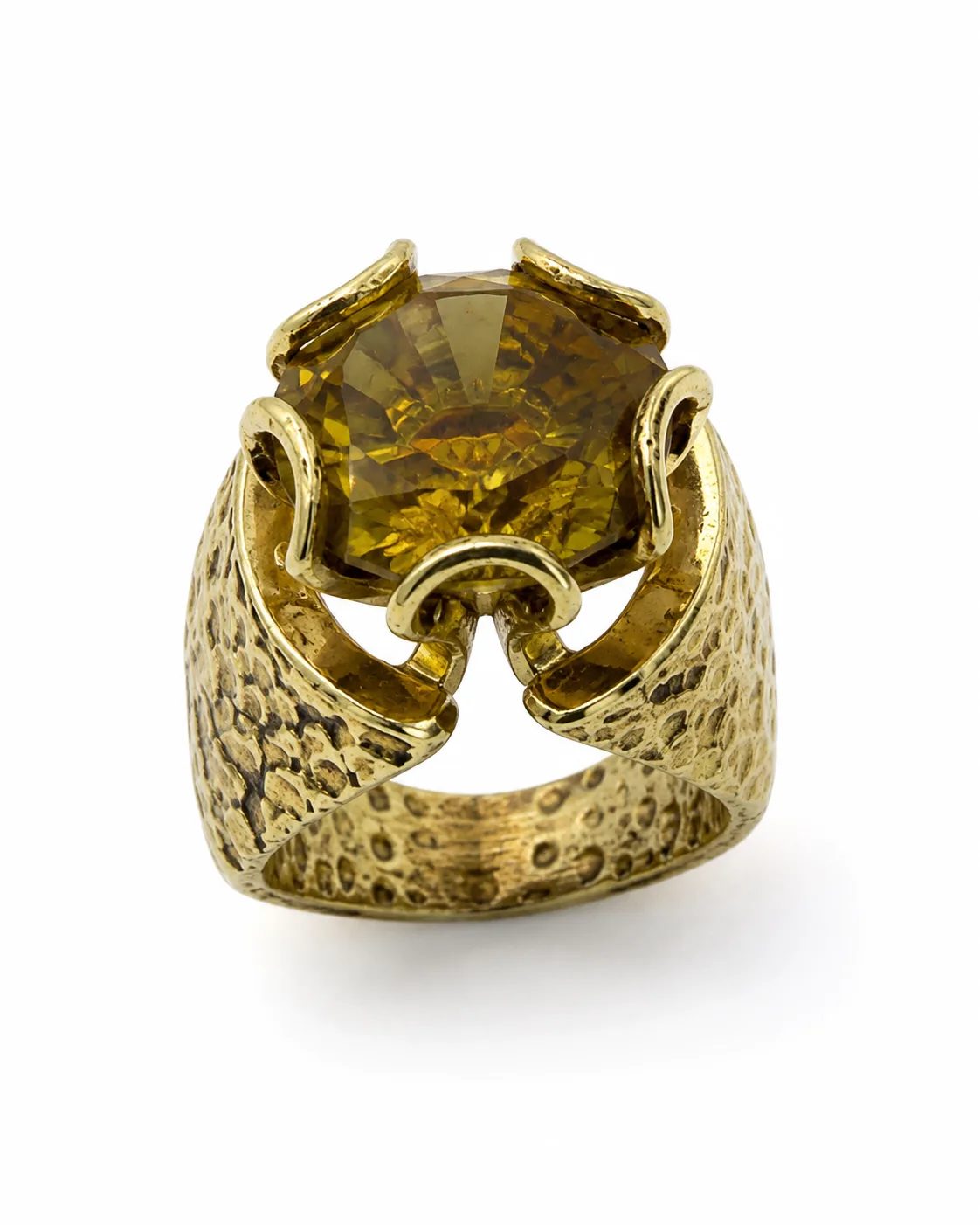 Gold-plated sterling silver statement ring with a large faceted zultanite gemstone, sculptural crown prongs and a hammered wide band
