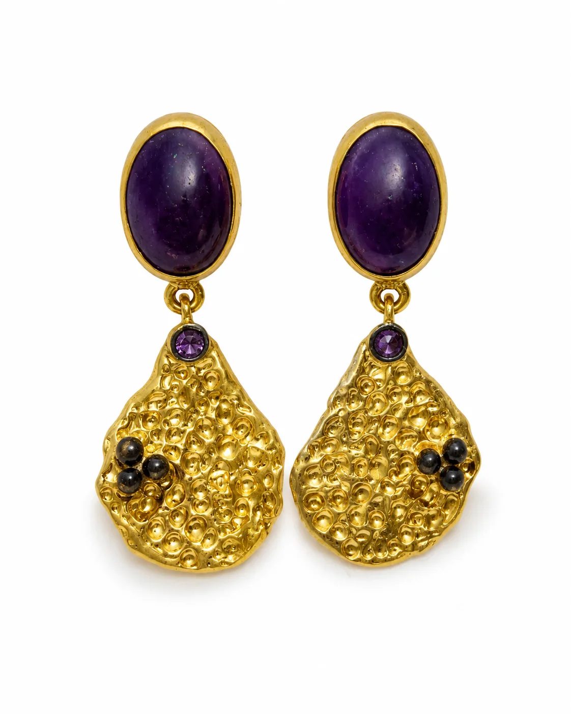 Gold-plated sterling silver drop earrings with amethyst stones, textured abstract drops and dark accent beads on a white background