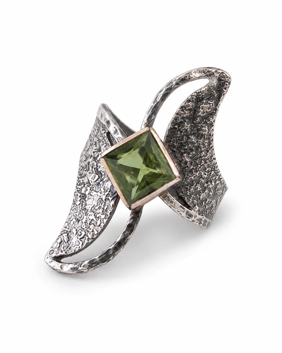 Geometric zultanite silver statement ring with a square green gemstone, bronze-toned setting and textured oxidized openwork