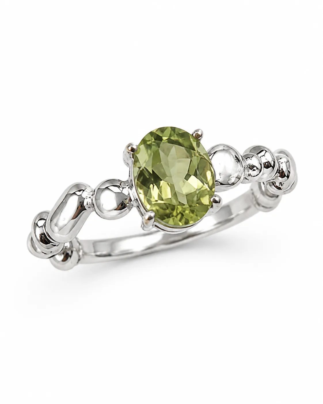 Lightweight silver ring with a faceted oval zultanite gemstone and polished bead accents on a white background