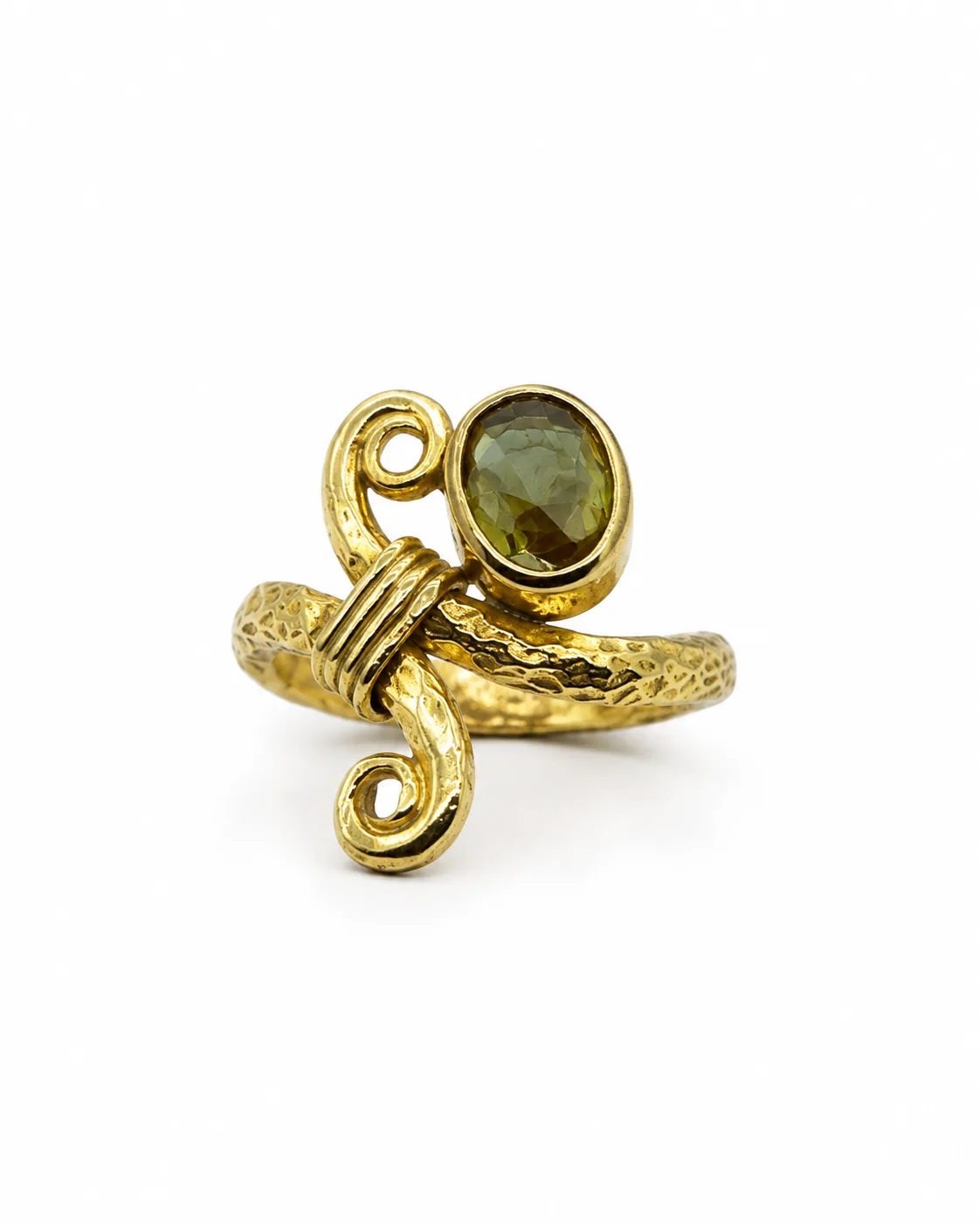 Gold-plated silver swirl ring with an oval green zultanite gemstone and hammered textured details on a white background