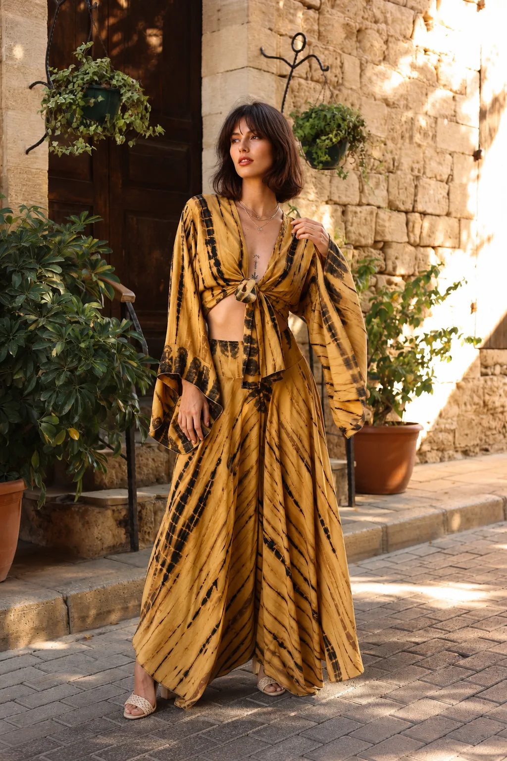 Sahara Ink mustard yellow and black two-piece women’s set