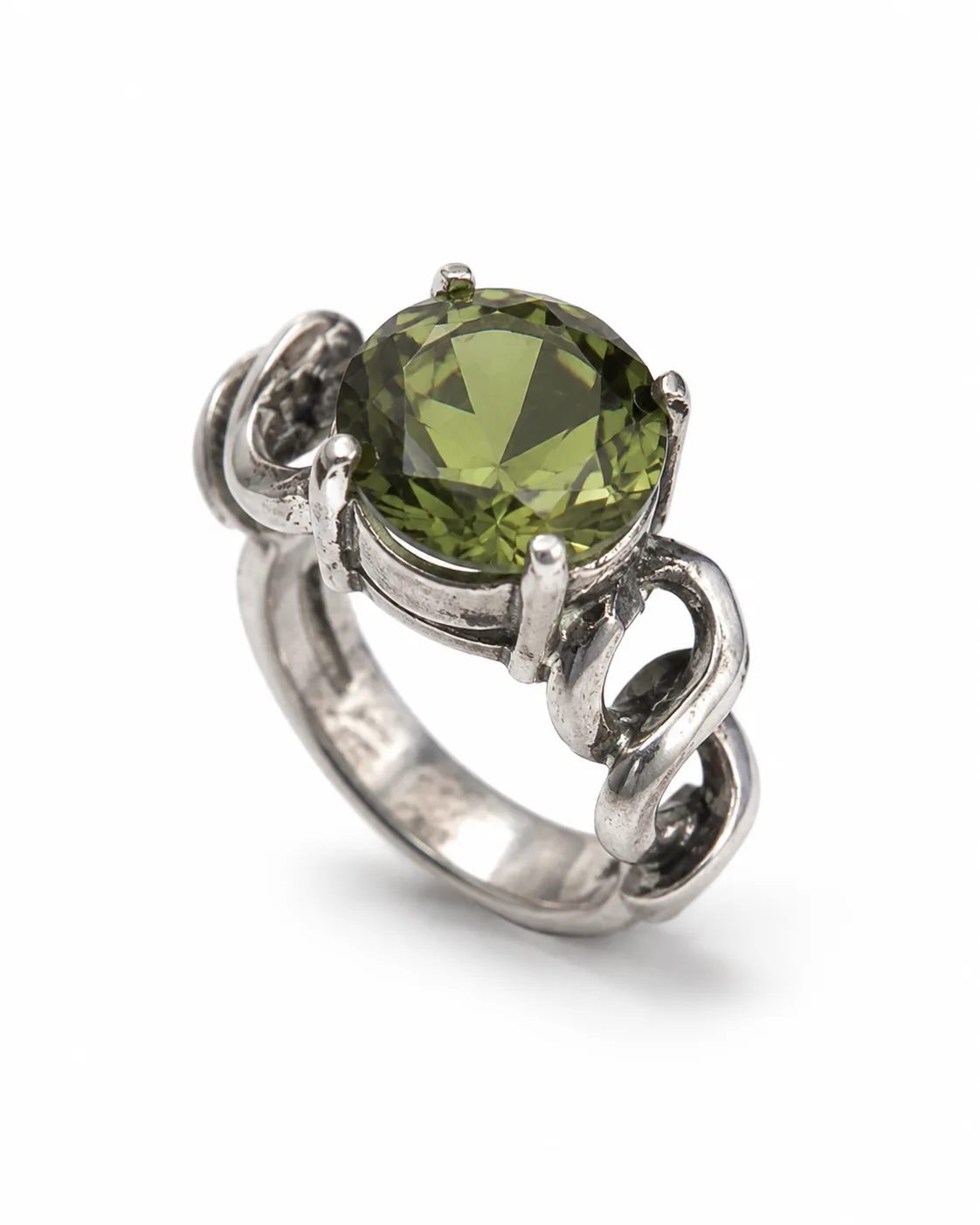 Round-cut zultanite sterling silver ring with a large faceted green gemstone, infinity-inspired shoulders and an oxidized prong setting