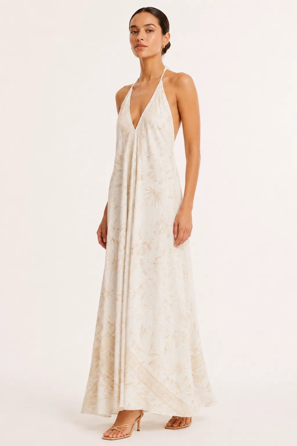 Ivory silk dress with deep V neckline and beige botanical print