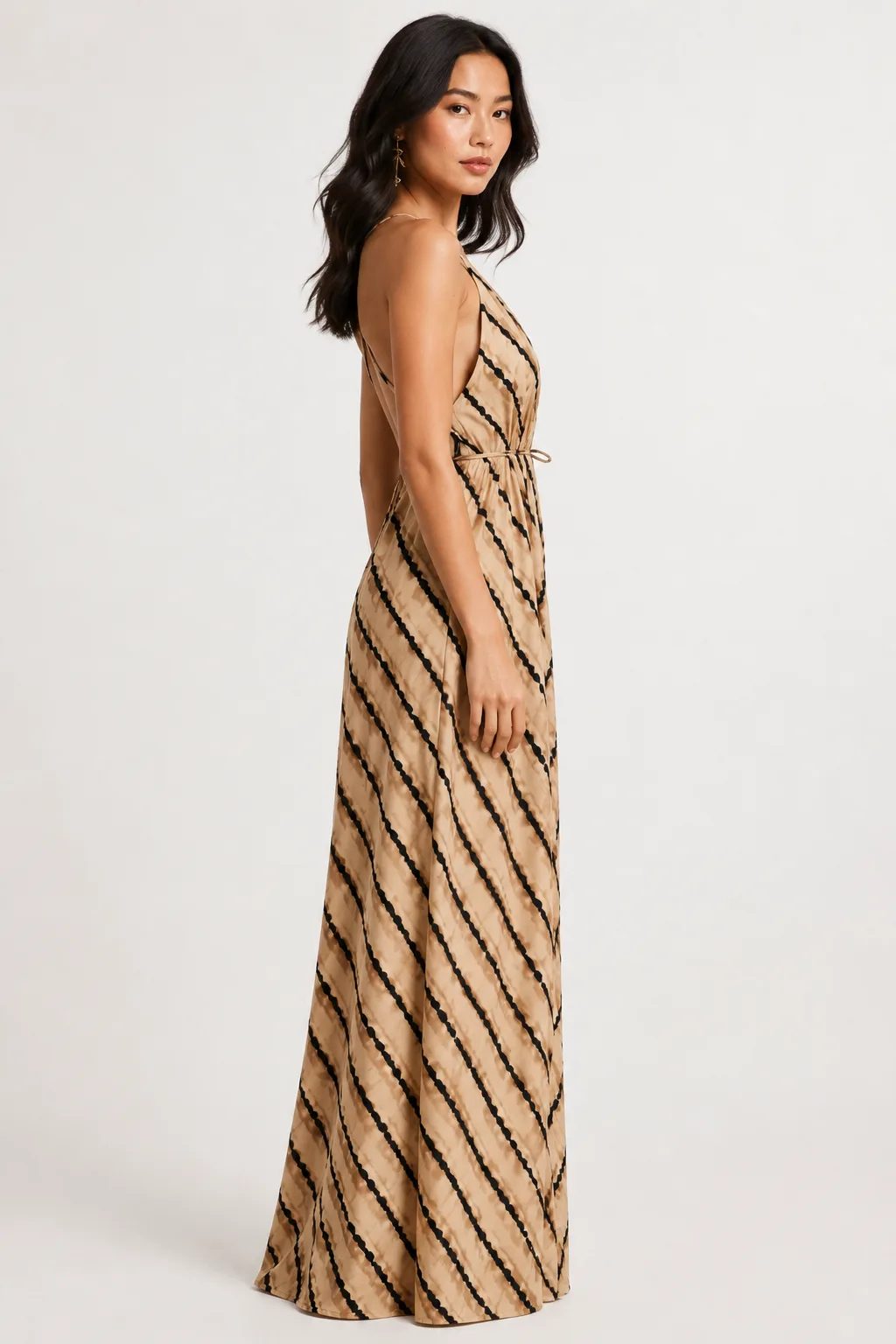 Beige maxi dress with deep V neckline and adjustable waist ties