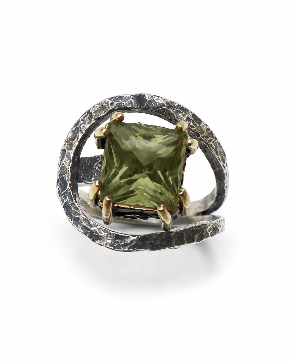 Orbit zultanite silver statement ring with a faceted square green gemstone and sculptural circular openwork on a white background