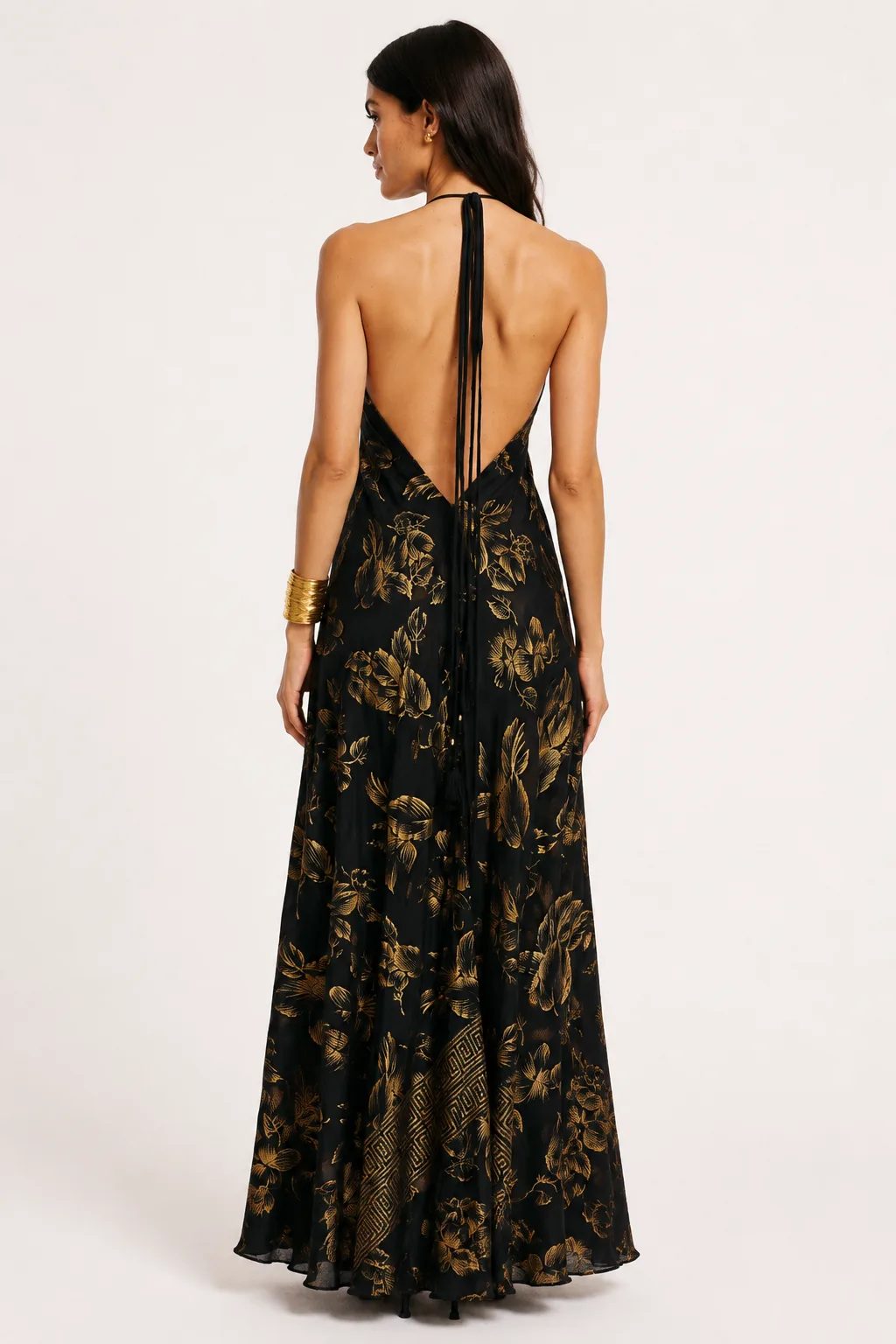 Black silk halter dress with metallic gold botanical pattern