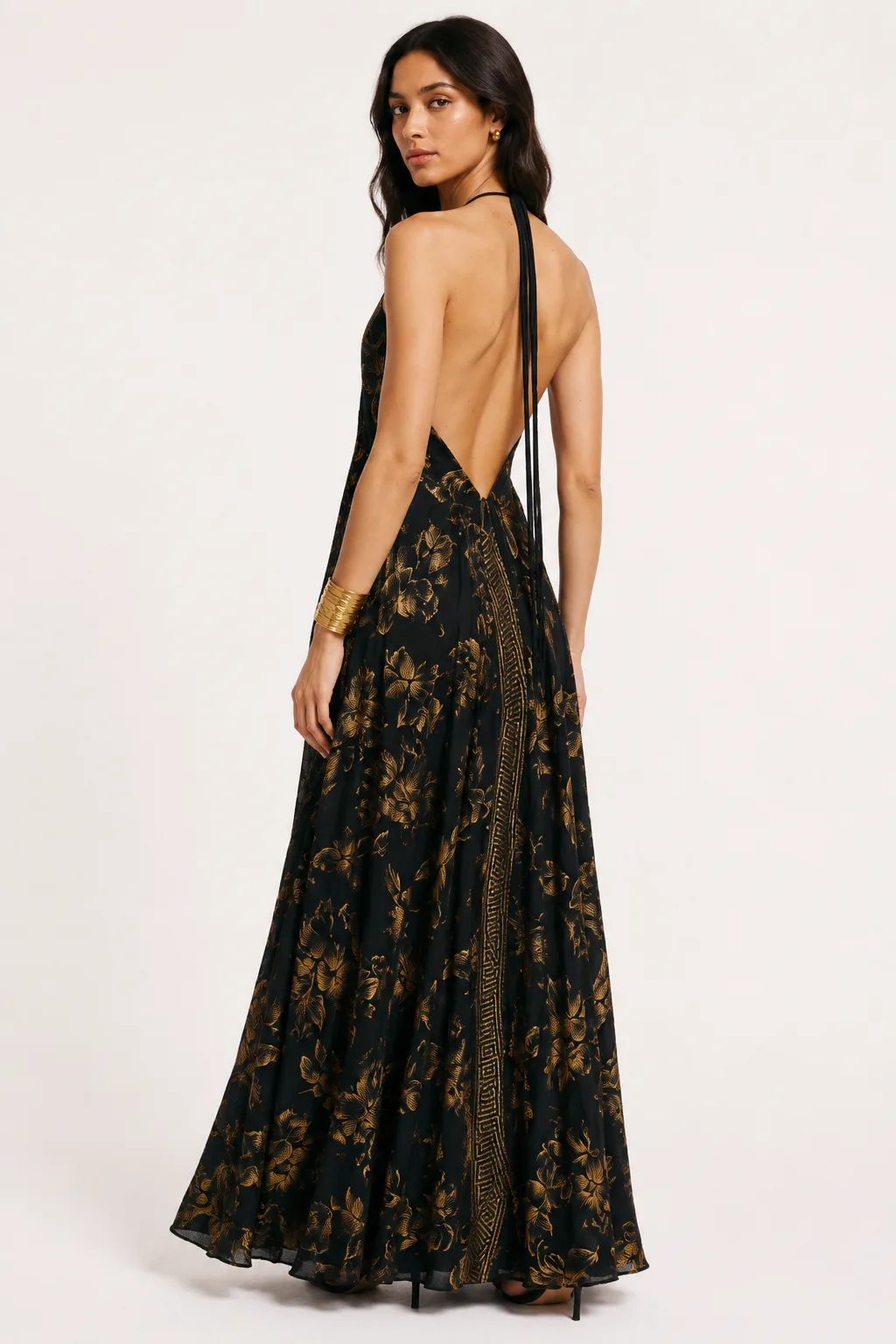 Low open-back black silk dress with long halter ties
